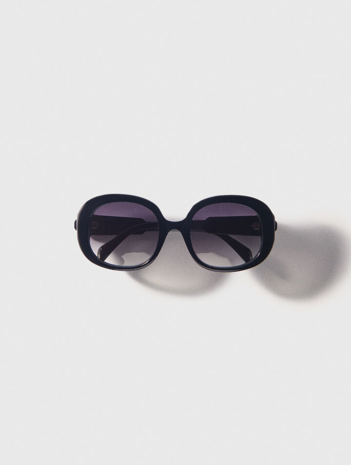 Round acetate glasses